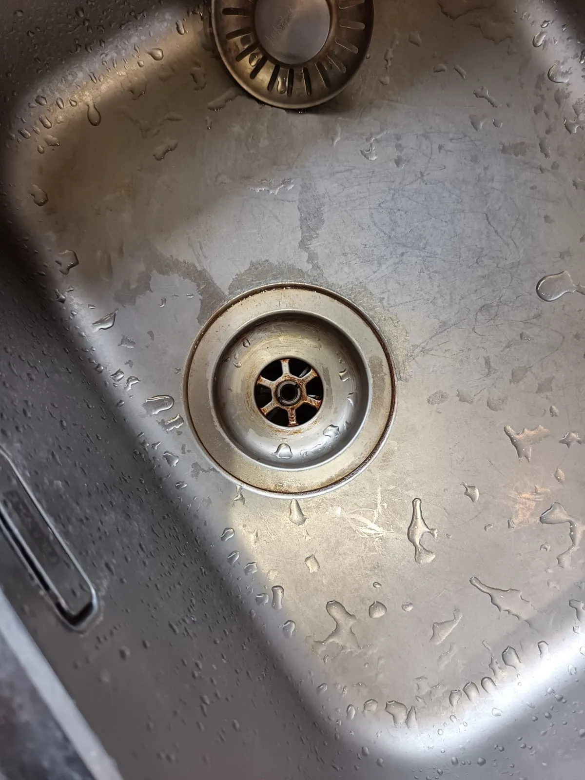 Clear bath waste after removing a hair and soap scum blockage - how to unblock a bath