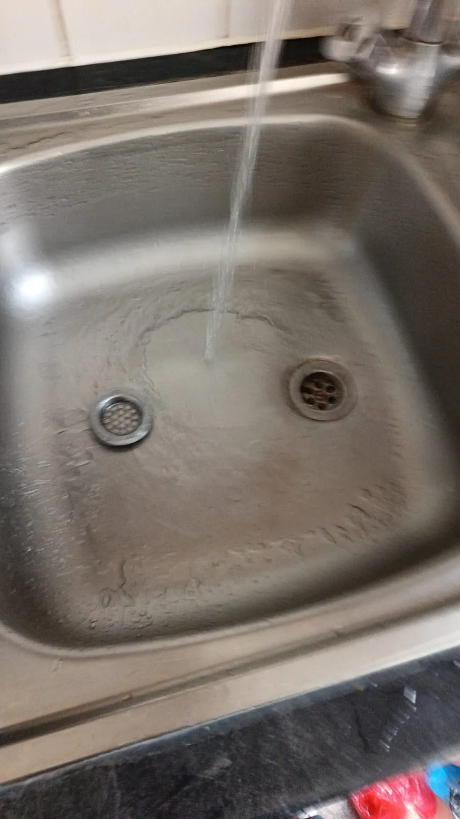 Kitchen sink flow test after drain clearance
